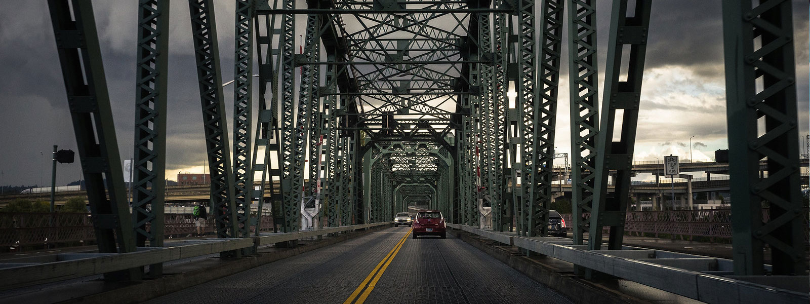 Steel truss bridge showcasing precision engineered components and high tolerance metal structures