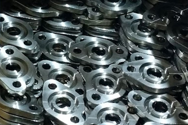 Fine blanking precision metal components for industrial applications by Attur International